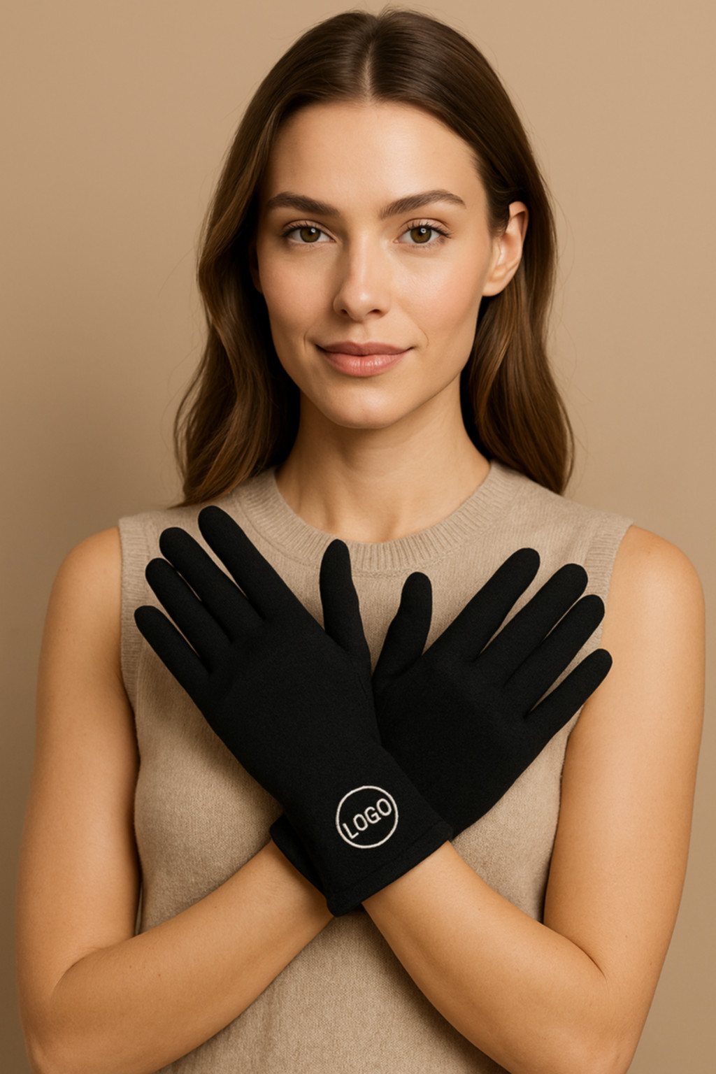 Woman wearing embroidered logo gloves